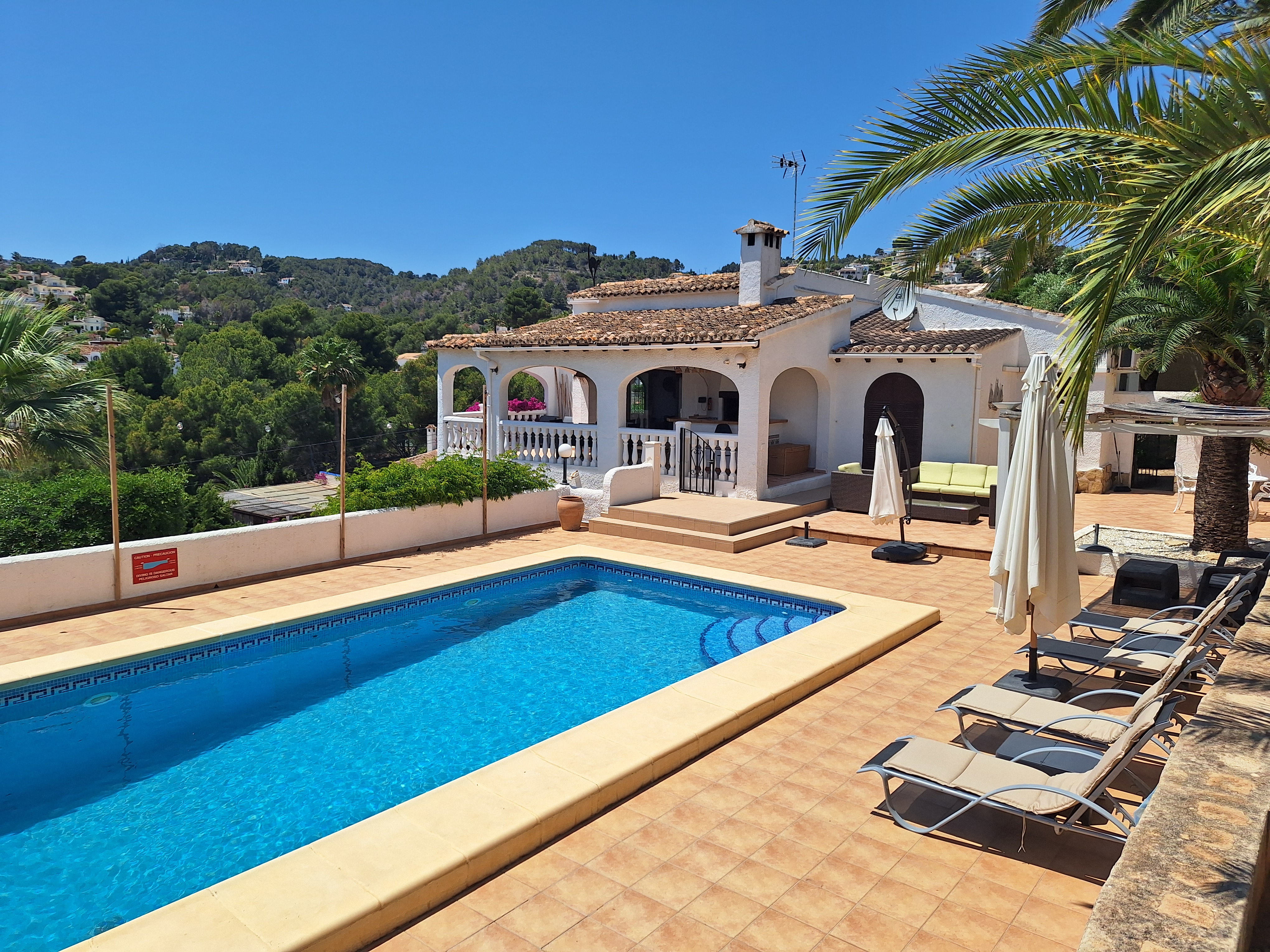 Relaxing by the pool